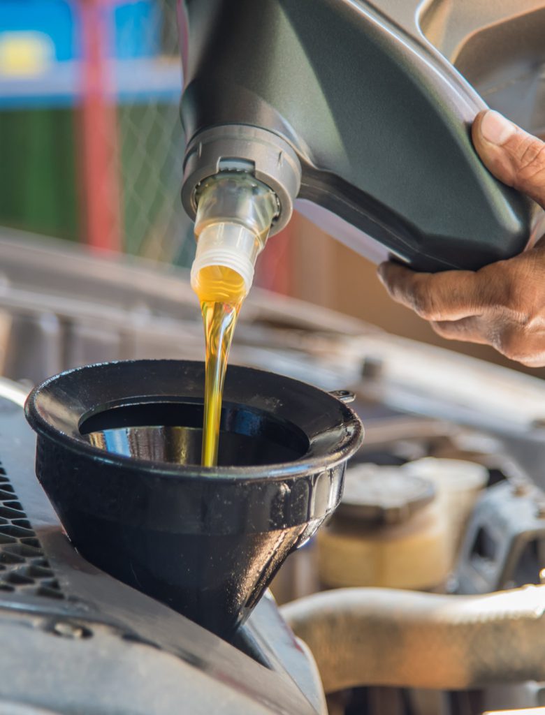 Engine oil pouring into a vehicle - Car Servicing Crieff, Perth and Kinross
